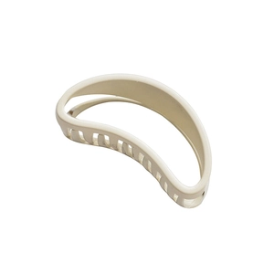 Minimalist beige hair claw clip in resin material for women on white background
