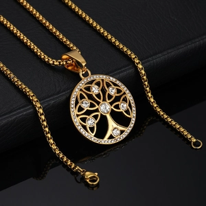 Golden Celtic Tree of Life pendant with sparkling crystals on a box chain for women