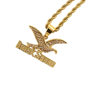 Hip hop gold plated eagle pendant necklace with Bricksquad lettering and iced out rhinestones