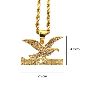Hip hop style gold-plated eagle pendant with Brick Squad letters and white rhinestones