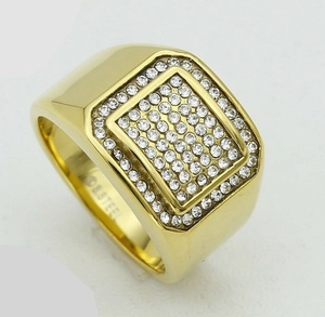 Macro detail of men's gold plated 316L stainless steel ring with micro-pave white zircon