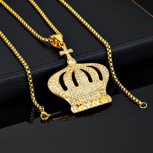 Hip hop gold crown king pendant necklace with white rhinestones on black background