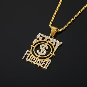 Iced out gold hip hop pendant necklace with STAY FOCUSED slogan and dollar sign