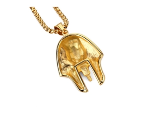 Close-up of the textured back of a gold pharaoh pendant with a durable box chain necklace