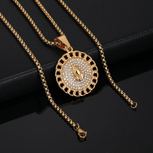 Golden round praying hands pendant necklace with sparkling rhinestones and bead chain