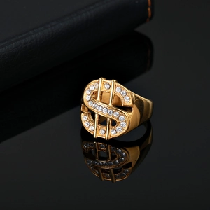 Hip hop style gold plated ring featuring dollar sign design with inset zircons