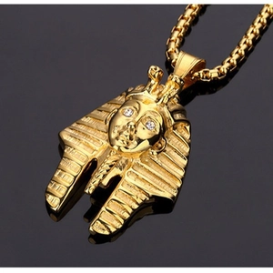 Vintage gold Egyptian Pharaoh pendant necklace with white diamond eyes on box chain
