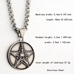 Macro view of stainless steel star pendant with vintage texture and circular link chain