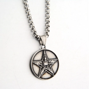 Vintage stainless steel necklace with pentagram star round pendant on white background