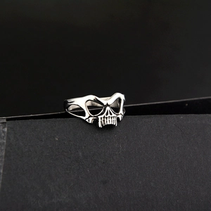 Silver skull ring with gothic punk hollow design made of durable stainless steel