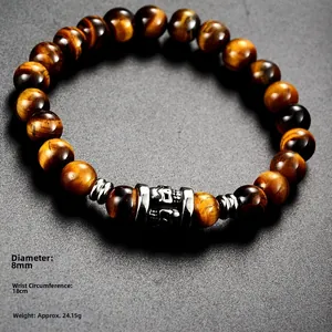 Detailed macro view of 8mm tiger eye stone beads bracelet with vintage steel tube charm