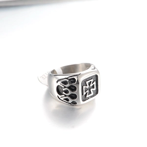 Men's punk stainless steel signet ring with Iron Cross and flame texture on white background