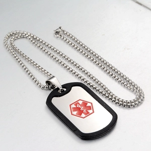 Macro detail of medical alert necklace with red star of life and silicone edge protector