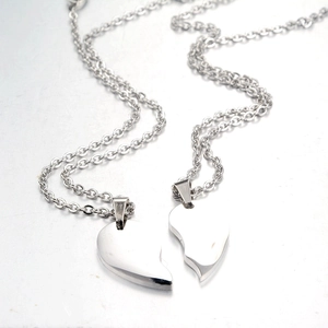 Polished stainless steel heart pendant necklace for couples with two piece puzzle design