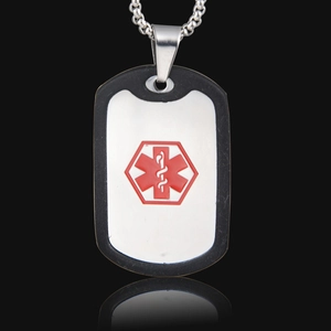 Macro detail of stainless steel medical alert dog tag necklace with red medical icon