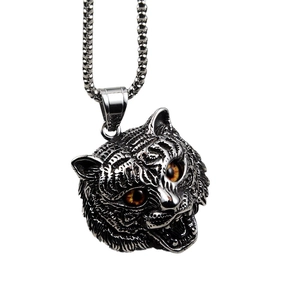 Hip hop style 3D tiger head pendant with amber eyes on a silver box chain necklace