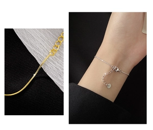 Close-up of S925 sterling silver snake chain bracelet with secure lobster clasp details