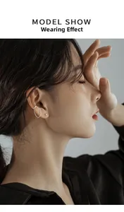 Detailed close-up of 925 sterling silver ear cuff and chain earring on model ear