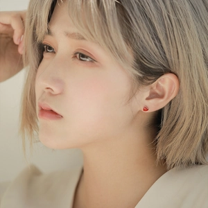 Elegant S925 silver minimalist red heart stud earrings shown on model for women
