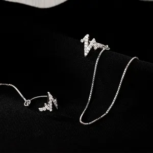 Minimalist heartbeat ear cuff and chain earring set with sparkling zircon stones