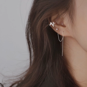 Three-piece silver earring set with letter ear cuff, stud, and long chain tassel