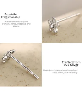 Macro shot of S925 sterling silver sunflower stud with sparkling zircon and hallmark