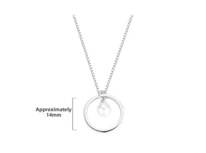 Detail of minimalist silver pendant featuring a 14mm round circle with a glossy pearl center