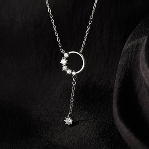Minimalist Y-shaped silver necklace with cz pavé circle and tassel pendant on black silk