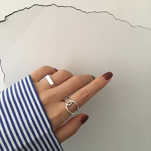 Minimalist silver geometric open rings set for women featuring a layered crossover design