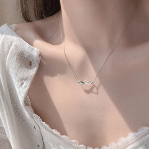 Elegant silver infinity symbol necklace for women with minimalist geometric Mobius pendant