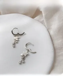 Détails de boucles d'oreilles étoile en argent sterling avec pompons et pierres zircon