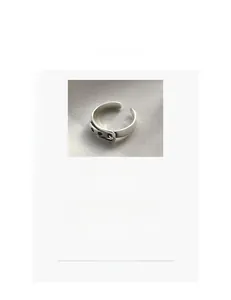 Detail view of 925 sterling silver belt-style buckle ring with adjustable opening