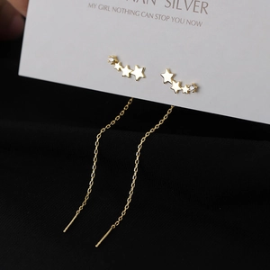 Elegant gold star tassel threader earrings with sparkling crystals and long metal chains