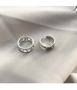 Detail of S925 silver belt buckle ring and hollow Roman numeral index finger band