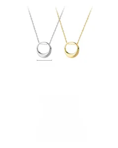 Detail showing simple geometric circle pendant necklaces in silver and gold, approx. 15mm