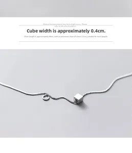Detail view of S925 sterling silver necklace featuring square pendant with shiny zircons