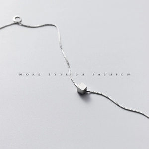 Minimalist S925 sterling silver necklace with a brushed geometric cube pendant on a box chain