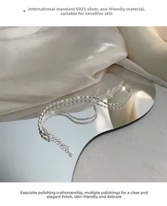 Detail of S925 sterling silver double-layer bracelet with polished finish for sensitive skin