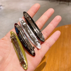 Set of four tortoiseshell acetate spring hair clips in various elegant colors and patterns