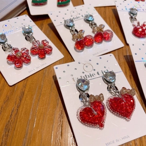 Sparkly red resin clip-on earring set for girls featuring cute heart and rabbit designs