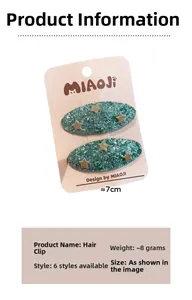 Detail view of 7cm emerald green sequin hair clips with golden stars for girls