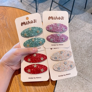 Colorful glitter hair clips for girls with star sequins on cardboards