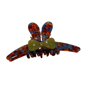 Pince à cheveux oreilles de lapin avec nœud vert et strass orange brillant