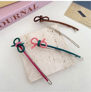 Three-piece long hair clips set with colorful minimalist knotted ribbon design