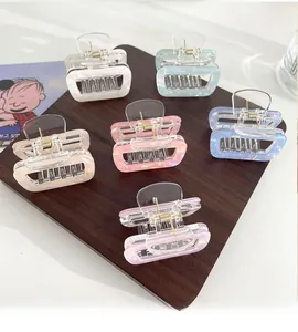Set of 6 iridescent rectangular hair claw clips in shimmering pastel acetate finishes