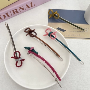 Vintage bow hair clips set in elegant colors with high-quality acrylic and metal base