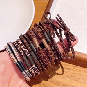 Elastic leopard print and plaid bow hair ties set in vintage brown tones