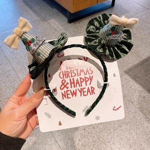 Serre-tête de Noël enfant avec chapeaux en velours vert, nœuds blancs et baies