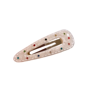Eleganter Acetat-Haarclip mit Marmormuster, bunten Strasssteinen und goldener Basis