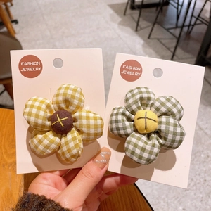 Cute cotton flower hair clip set with yellow and green plaid fabric and floral patterns